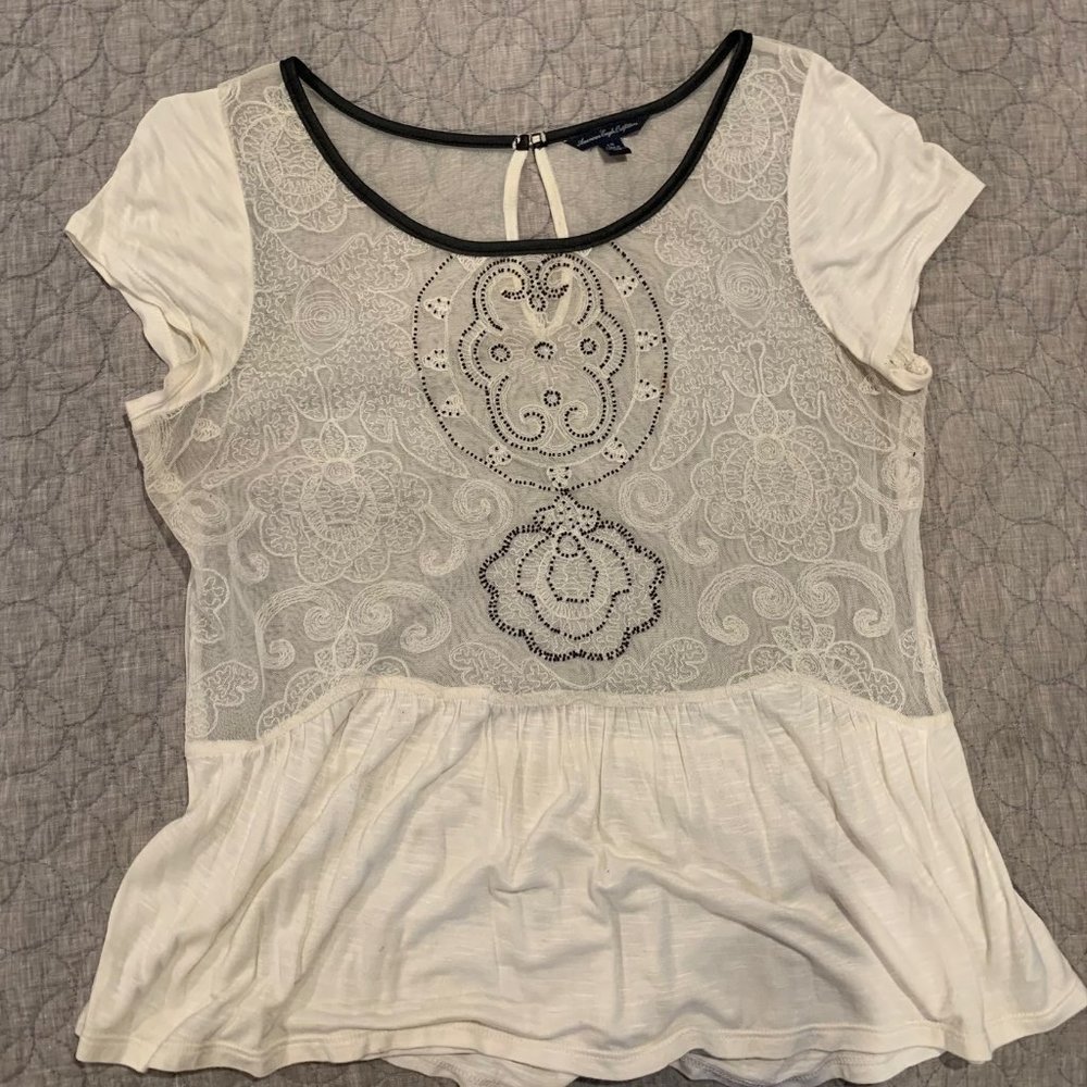 American Eagle Outfitters cream colored mesh top in size Large.